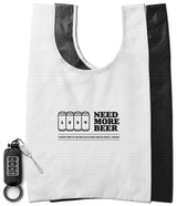 Day-Me Bag - White tote bag with "NEED MORE BEER" text and four-can graphic, shown with a matching black folded pouch.
