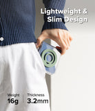 Dual Magnetic Silicone Ring - A person in a navy ribbed cardigan and white pants holds a slim, lightweight clear case with a green circular magnetic ring design. Text overlays highlight the product's lightweight and slim design, with weight and thickness details shown at the bottom.