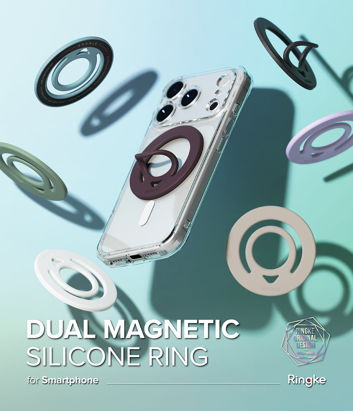Dual Magnetic Silicone Ring - A clear smartphone case with a dark brown magnetic ring holder, shown floating on a light blue gradient background with several colorful ring accessories floating around it.
