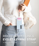 Holder Link Eyelet Keyring - A person wearing a phone case with a pink and white fabric strap attached to a metal eyelet.