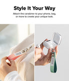 Holder Link Eyelet Keyring - Fabric straps with carabiners attached to a white bag and a wireless earbud case.