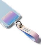 Holder Link Eyelet Keyring - A pastel gradient wrist strap attached to a smartphone case via a metal ring and clear tab.