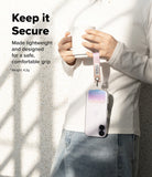 Holder Link Eyelet Keyring - A person holds a mug with a phone attached to a pink fabric wrist strap via a metal eyelet.