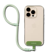 Holder Link Flow Hand Strap P-Type - A light green braided wrist strap attached to a clear phone case with a green tab.