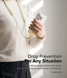 Holder Link Flow Shoulder Strap Y-Type - Person wearing a pale yellow Y-type phone strap attached to a smartphone.