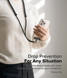 Holder Link Flow Shoulder Strap Y-Type - Person wearing a black Y-type phone strap attached to a smartphone in a clear case.