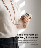 Holder Link Flow Shoulder Strap Y-Type - Person wearing a pink Y-type phone strap attached to a smartphone in a clear case.