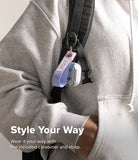 Galaxy Buds 4 Pro / 4 Case | Air - Clear earbud case with a purple and blue fabric strap clipped to a backpack strap.