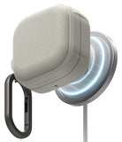 Samsung Galaxy Buds On / 4 Pro / 4 Case | Onyx Magnetic - Textured gray case magnetically attached to a glowing wireless charger.