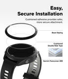 Forerunner 265 | Bezel Styling - Exploded view showing a watch bezel, adhesive ring, and Garmin Forerunner 265 watch body.