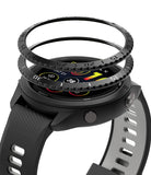 Forerunner 265 | Bezel Styling - A black Garmin smartwatch with a floating, textured bezel ring hovering above the watch face.