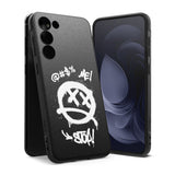 Galaxy S23 Case | Onyx Design - Black phone case with white graffiti-style skull icon and text on a dark geometric surface.