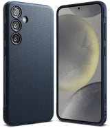 Galaxy S24 Case | Onyx - Multiple textured Onyx phone cases for Galaxy S24 arranged on a dark surface against a green wall.