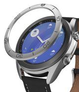 Galaxy Watch 3 (41mm) | Bezel Styling - A silver metallic bezel ring hovering above a Galaxy Watch 3 with a weather display.