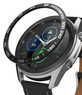 Galaxy Watch 3 (45mm) | Bezel Styling - A black tachymeter bezel ring hovering above a silver Galaxy Watch 3 with a leather strap.