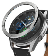 Galaxy Watch 3 (45mm) | Bezel Styling - A silver metal bezel ring hovering above a Galaxy Watch 3 with a black leather strap.