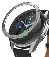 Galaxy Watch 3 (45mm) | Bezel Styling - A metallic bezel ring hovering above a Galaxy Watch 3 with a black leather strap.