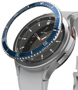 Galaxy Watch 4 Classic 46mm | Bezel Styling - Smartwatch with green bezel styling charging on a wireless dock.