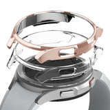 Galaxy Watch 4 Classic 46mm Case | Slim - Rose gold and clear protective watch cases hovering above a silver smartwatch.