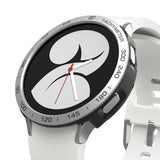 Galaxy Watch 4 40mm | Air Sports Black + Bezel Styling - Smartwatch with white band and silver tachymeter bezel.