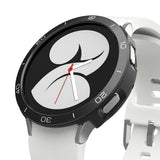 Galaxy Watch 4 40mm | Air Sports Black + Bezel Styling - Galaxy Watch 4 40mm - Black bezel styling on a smartwatch with a white silicone band and abstract watch face.