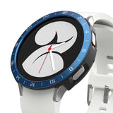 Galaxy Watch 4 44mm | Air Sports Black + Bezel Styling - Galaxy Watch 4 44mm - Smartwatch with blue metallic bezel styling, white silicone strap, and analog watch face.