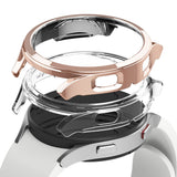 Galaxy Watch 4 40mm Case | Slim - Exploded view of a rose gold and clear protective case hovering over a white smartwatch.
