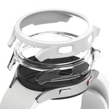 Galaxy Watch 4 40mm Case | Slim - Exploded view of a white watch case, clear protective cover, and a black smartwatch.