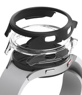 Galaxy Watch 4 (44mm) Case | Slim - Exploded view of a black and clear protective watch case hovering over a smartwatch.