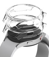 Galaxy Watch 4 (44mm) Case | Slim - Two transparent protective cases hovering above a silver Galaxy Watch 4.