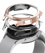 Galaxy Watch 4 (44mm) Case | Slim - Exploded view of a rose gold watch case hovering above a silver Galaxy Watch 4.