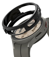 Galaxy Watch 5 Pro Case | Air Sports - A black protective frame hovering above a grey Galaxy Watch 5 Pro.