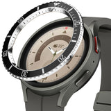 Galaxy Watch 5 Pro (45mm) | Premium Bezel Styling - A black, numbered watch bezel hovering above a grey Galaxy Watch 5 Pro.