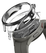 Galaxy Watch 5 Pro Case | Slim - A transparent, slim protective case hovering above a gray Galaxy Watch 5 Pro.
