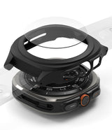 Galaxy Watch Ultra | Slim Extend & Glass - A clear protective case hovering over a Galaxy Watch Ultra amidst many others.