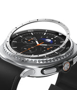 Galaxy Watch 8 Classic 46mm | Inner Bezel Styling - Silver metal bezel ring hovering above a smartwatch face.