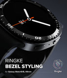 Galaxy Watch 9 / 8 44mm | Bezel Styling - Close-up promotional render of a black smartwatch with a textured bezel and dark band, featuring watch face text and branding for Ringke Bezel Styling.