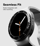 Galaxy Watch 9 / 8 44mm | Bezel Styling Premium - A close-up of a smartwatch with a black round face, silver bezel details, and a dark gray band, shown on a light gray background with the text 'Seamless Fit' and 'Perfect integration with CNC machining.'.