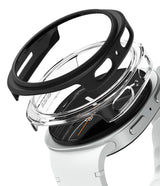 Galaxy Watch 8 44mm Case | Slim - Exploded view of a black protective case hovering above a clear case on a smartwatch.