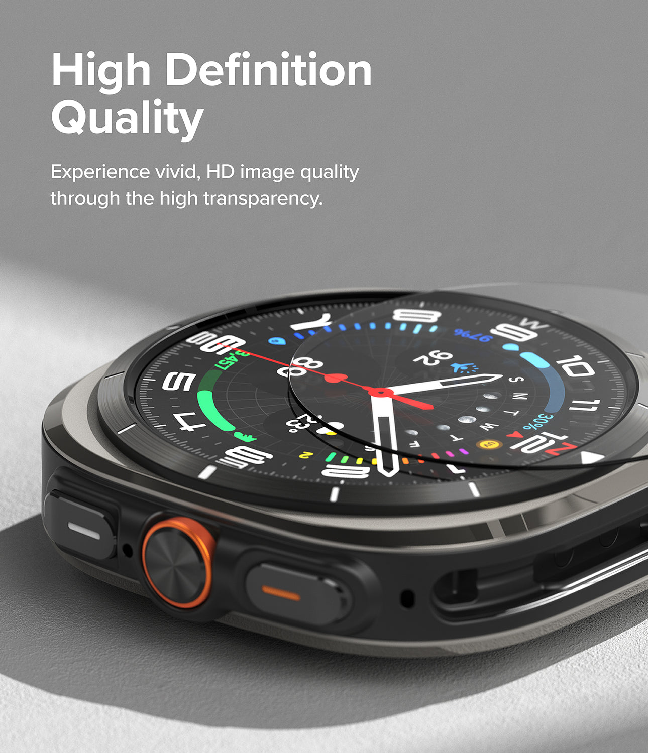 Galaxy Watch Ultra 2 Screen Protector | Tempered Glass (4 Pack) - R9 - A close-up of a smartwatch with a black and silver case, featuring a colorful digital watch face and an orange side button. The image includes marketing text on a gray background reading 'High Definition Quality'.