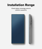 [Bundle] Galaxy Z Fold 8 Ultra | Fusion Magnetic + Cover Display Easy Slide Tempered Glass (2P) - A smartphone shown from the back and side on a light gray background, with text above reading 'Installation Range' and 'Check glass coverage area to confirm overall fit.' This is an auxiliary informational image rather than a pure product hero shot, so subject_type is Instruction Diagram.