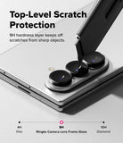 Galaxy Z Fold 8 Ultra | Camera Lens Frame Glass (2 Pack) - A utility knife blade presses against a phone camera lens protector, demonstrating 9H scratch resistance.