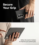 Galaxy Z Fold 8 Ultra MagSafe Wallet | Folio Grip Wallet Magnetic - Two-panel product demonstration showing a black phone grip case with built-in holders. The top panel shows a person holding a phone in the case with the text 'Secure Your Grip.