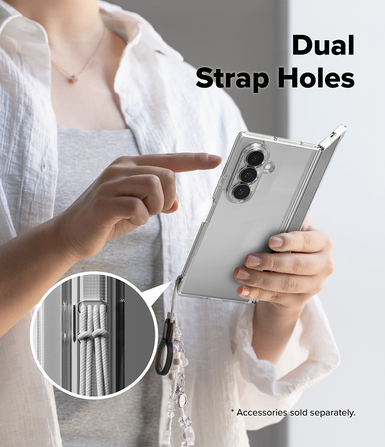 Galaxy Z Fold 8 Ultra Case | Fusion - Clear phone case with dual strap holes, shown held in hand.