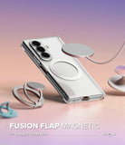 Galaxy Z Fold 8 Ultra Case | Fusion Flap Magnetic - A clear magnetic phone case with a silver metallic ring stand, shown on a smartphone. The case features a circular magnetic ring and a hinged flap, displayed with matching magnetic rings on a pastel pink and purple gradient background.