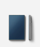 Galaxy Z Fold 8 Screen Protector | Cover Display Easy Slide Tempered Glass (2 Pack) - A silver smartphone shown from the back and side on a clean white background. The back panel has a dark blue textured finish with a thin blue accent line along the edge.