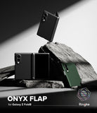 Galaxy Z Fold 8 Case | Onyx Flap - Three Ringke Onyx Flap cases for Samsung Galaxy Z Fold8 are displayed in a stylized studio setting with dramatic lighting and dark rocks. Two cases are black and one is forest green.