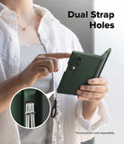 Galaxy Z Fold 8 Case | Onyx Flap Magnetic - A person holds a dark green phone case with a wrist strap and tassel, pointing to the case while text reads 'Dual Strap Holes.' A circular inset shows the strap attachment detail.