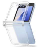 Galaxy Z Flip 7 FE Case | Slim Hinge - Clear protective case with integrated hinge cover on a light blue folding phone.