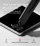 Galaxy Z Flip 8 Camera Protector | Camera Lens Frame Glass (2 Pack) - A utility knife blade presses against a phone camera lens protector, demonstrating 9H scratch resistance.